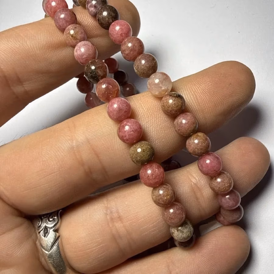 Rodonit Bileklik 6 mm İncele ve Satın Al Rodonit Bileklik 6 mm - Orijinal Doğal Taş ve Şifa Kristali Görsel 1