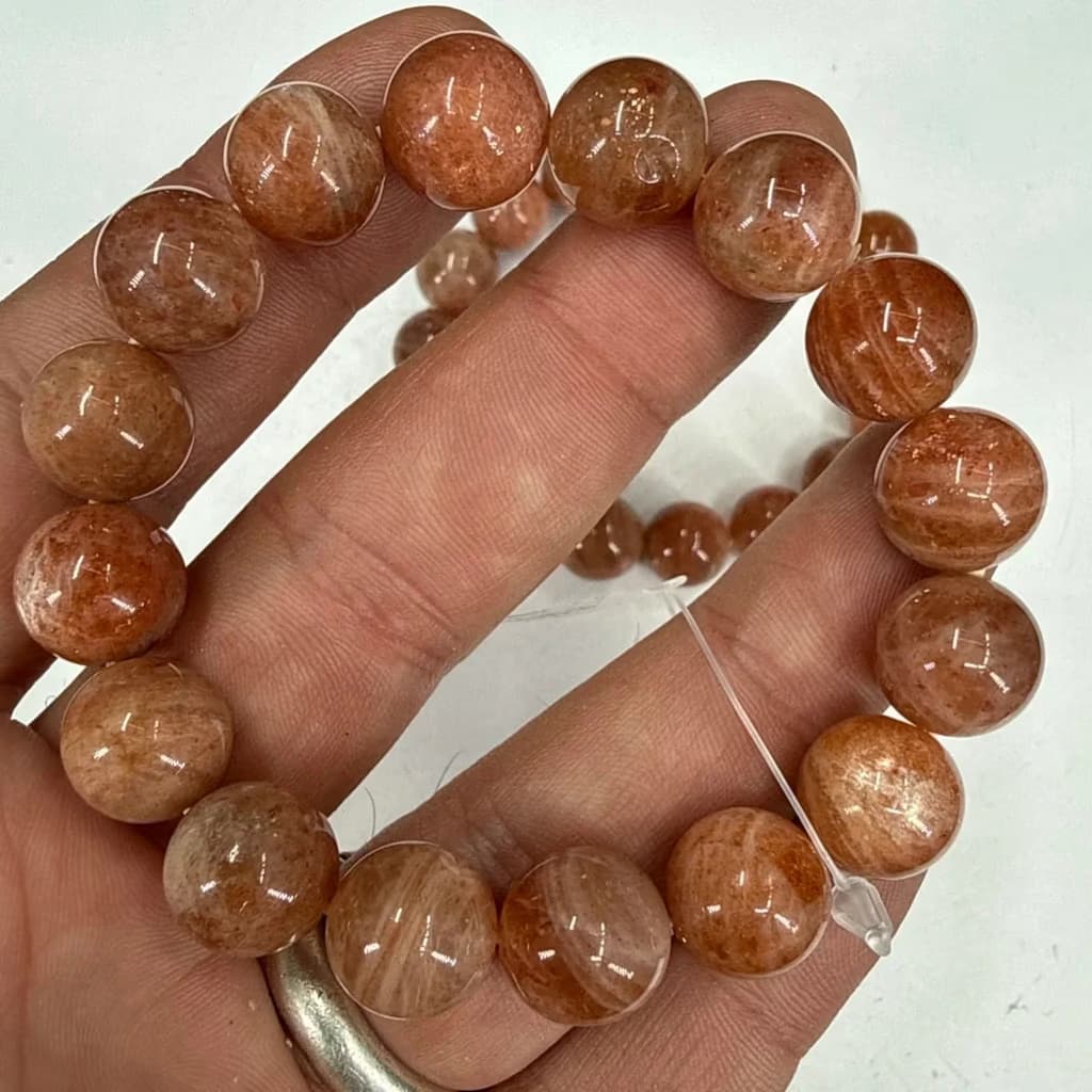 Arusha Güneş Taşı Bileklik 12mm İncele ve Satın Al Arusha Güneş Taşı Bileklik 12mm - Orijinal Doğal Taş ve Şifa Kristali Görsel 1