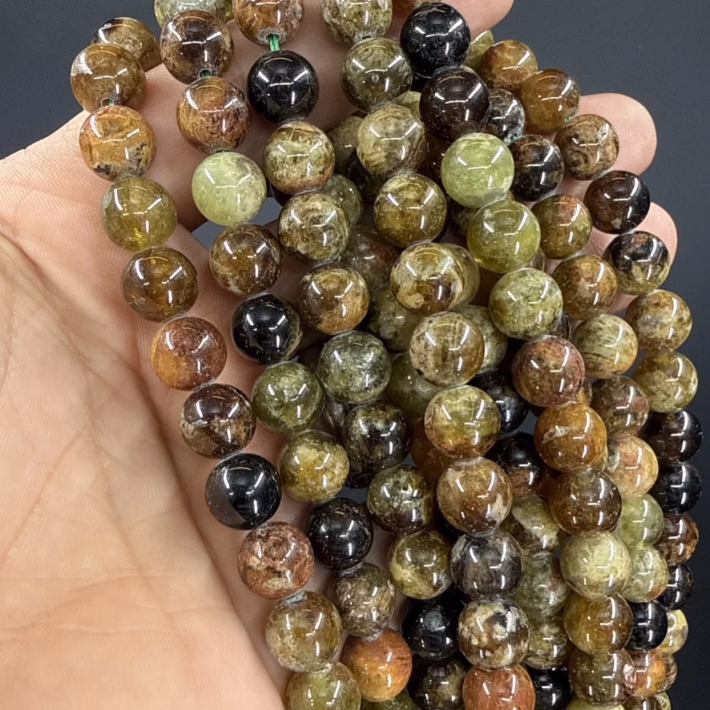Garnet Yeşil Dizi 10 mm İncele ve Satın Al Garnet Yeşil Dizi 10 mm - Orijinal Doğal Taş ve Şifa Kristali Görsel 1