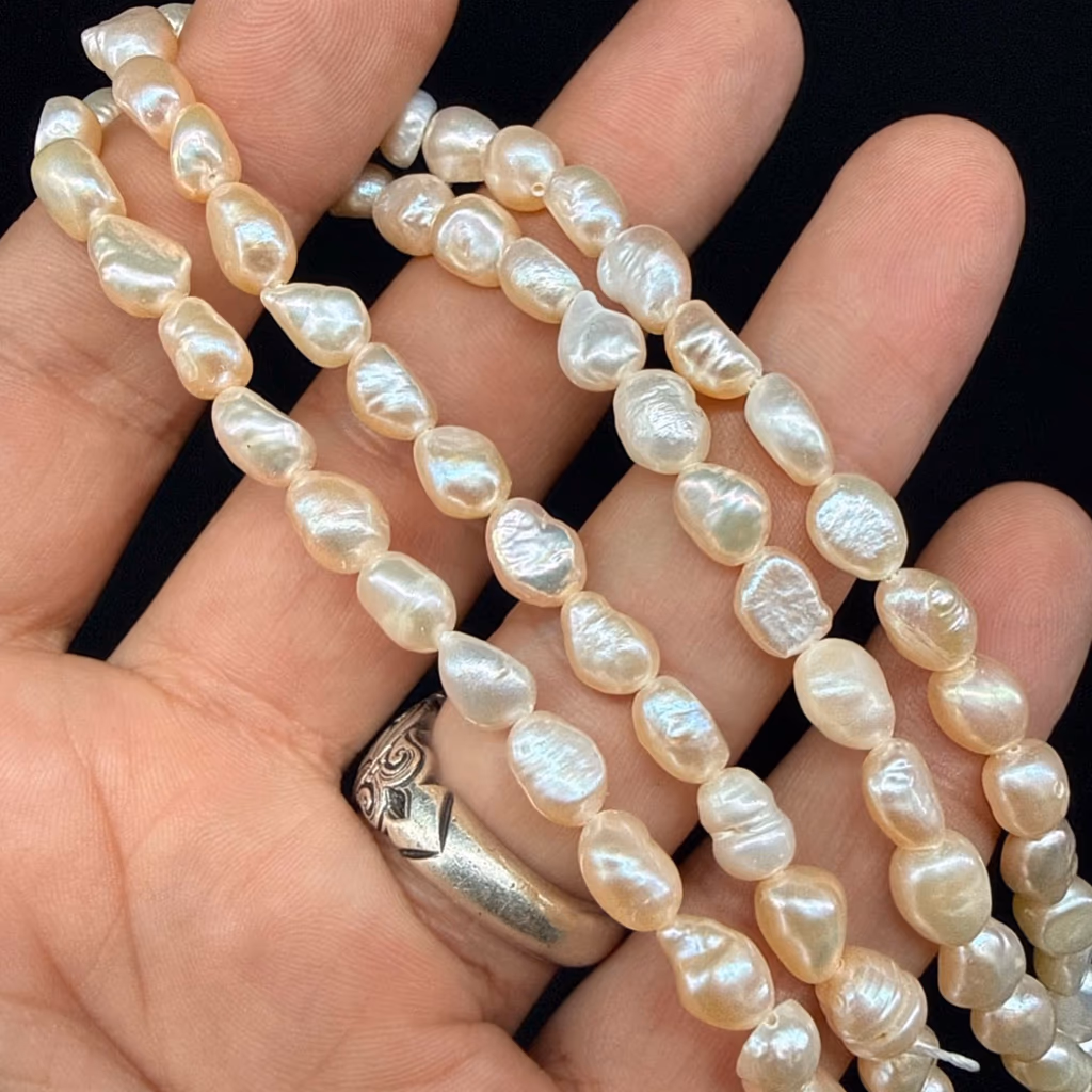 İnci Somon Dizi 6x8 mm İncele ve Satın Al İnci Somon Dizi 6x8 mm - Orijinal Doğal Taş ve Şifa Kristali Görsel 1